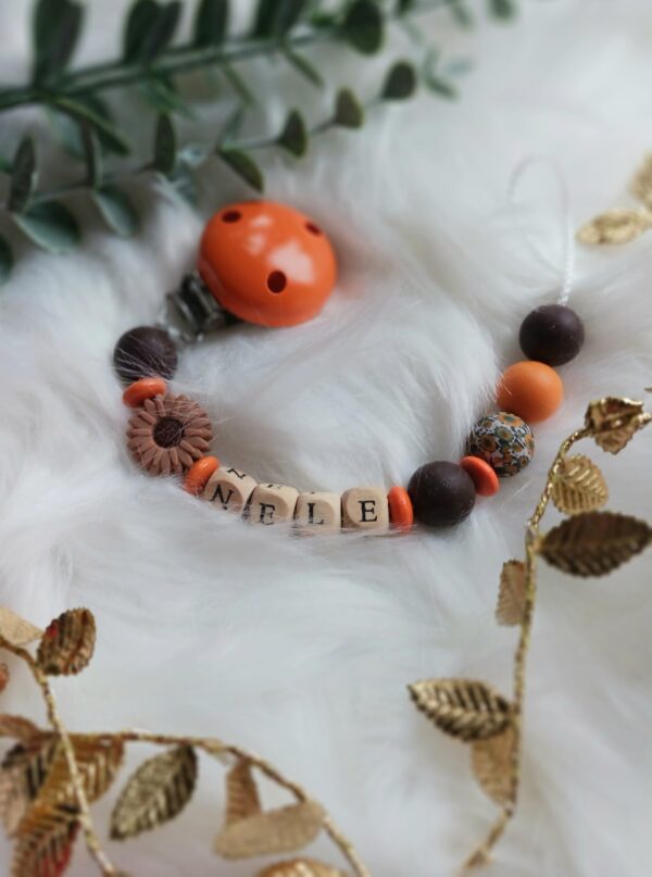 Schnullerkette orange, braun, Blume
